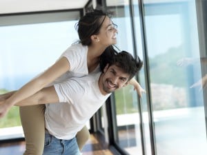 romantic happy young couple relax at modern home indoors and hav