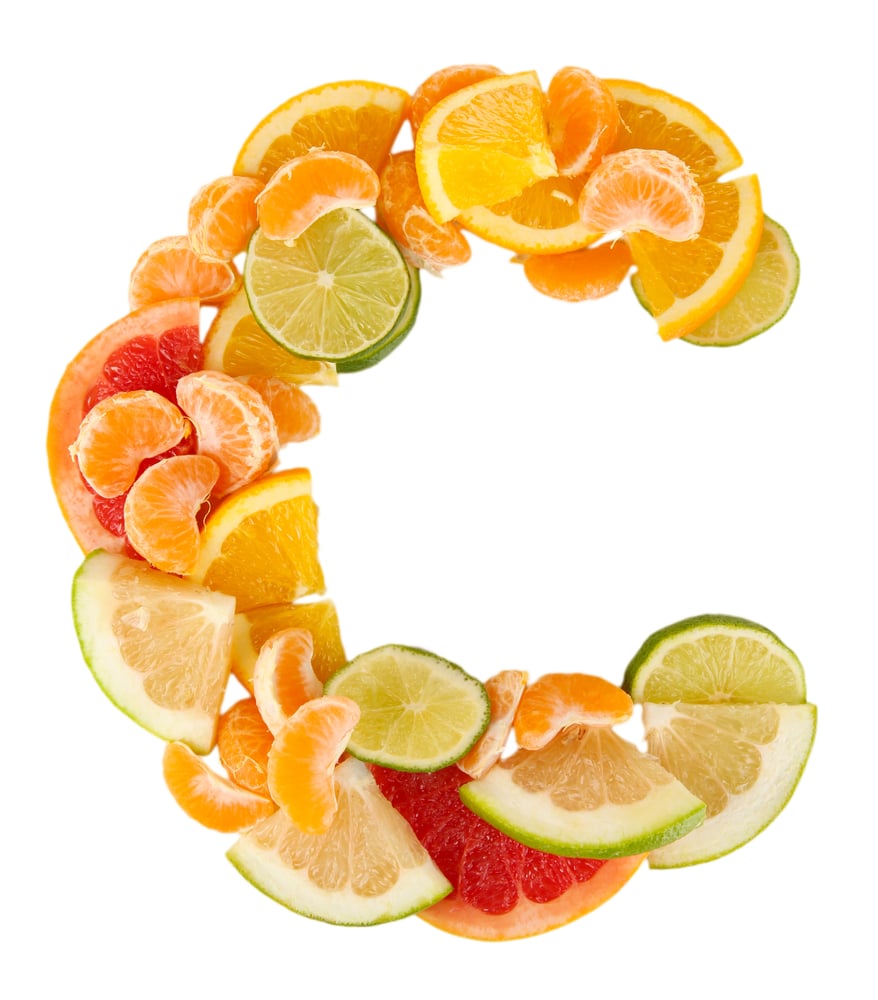 Várias laranjas compondo a letra "c"