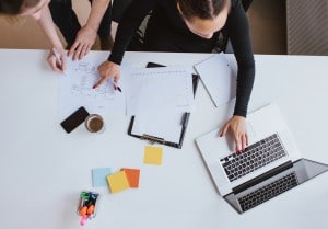 Business Team Working On A New Plan With Laptop