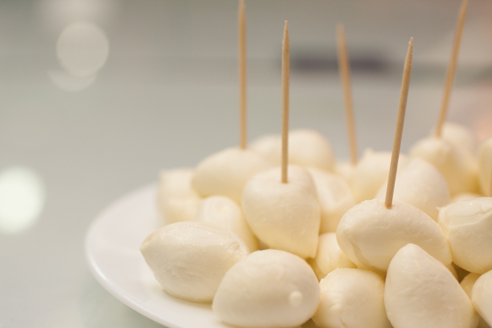 Buffalo Mozzarella appetizer into the pot on white background