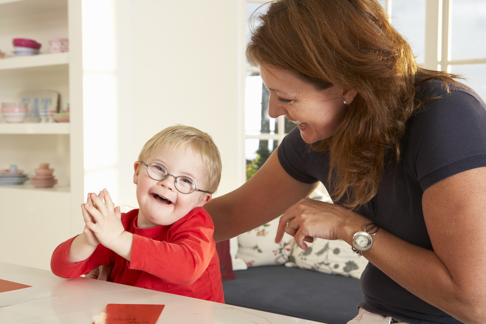 Downs Syndrome boy having speech therapy