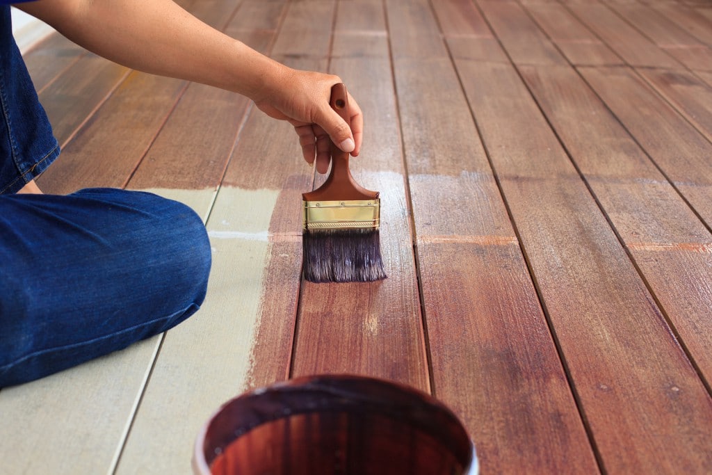 hand painting oil color on wood floor use for home decorated house renovation and housing construction theme