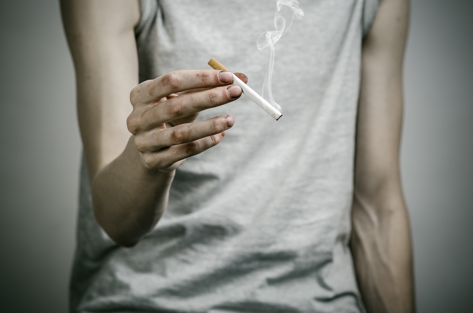 Cigarettes, Addiction And Public Health Topic: Smoker Holds The