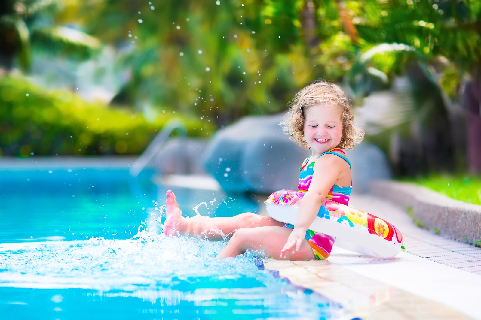 Little Girl In A Swimming Pool