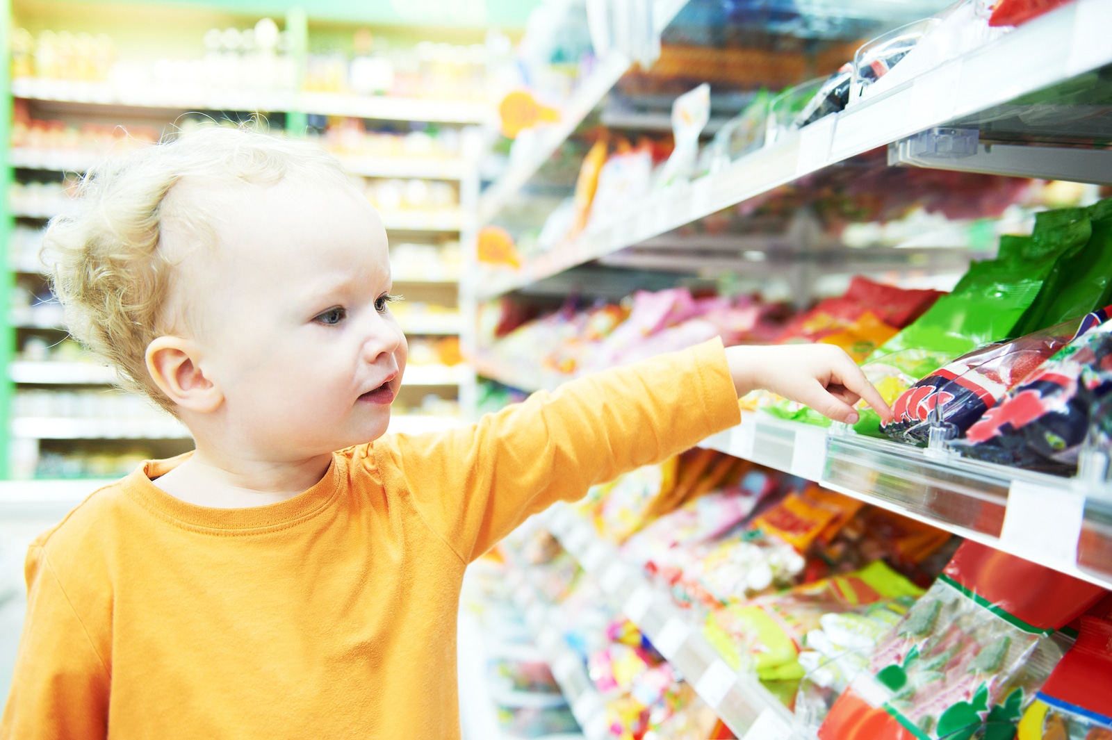 child making food shopping at grocery store