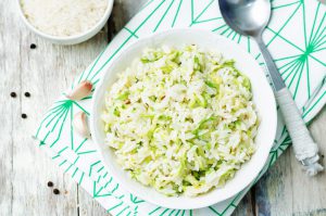 zucchini cheese rice on a dark wood background