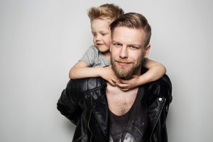 Happy Father and Son. Fathers day. Studio portrait over white background