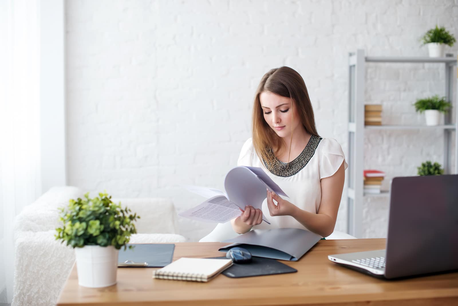 businesswoman with laptop and diary concept freelance work at ho