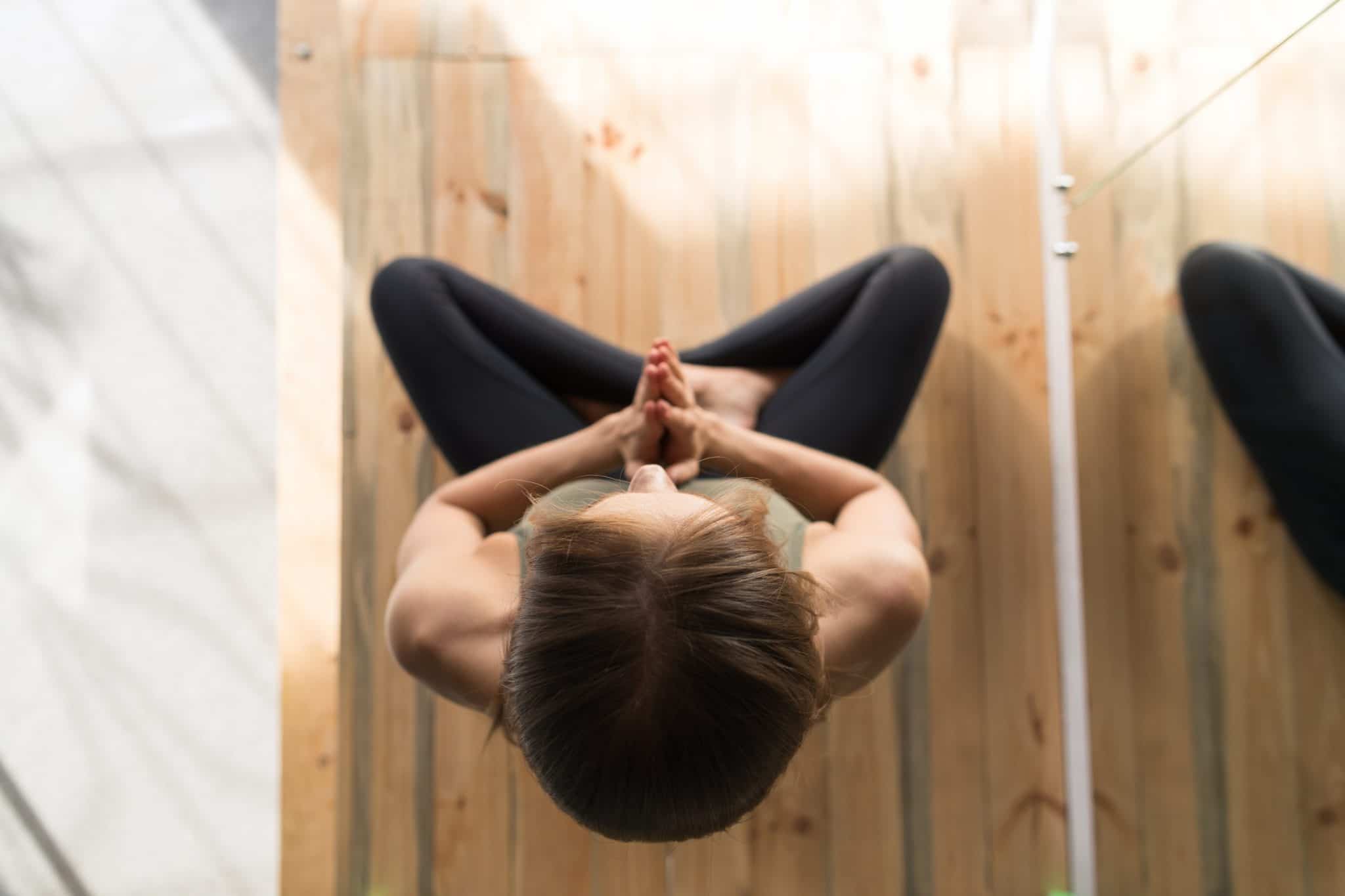 Woman Doing Yoga Exercises In Gym, Sport Fitness Girl Sitting Lotus Pose Meditation Relaxation