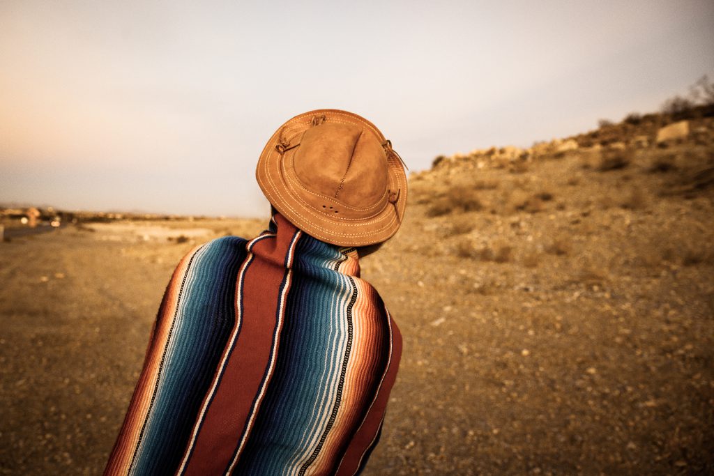 Hipster Traveler in desert of southern Nevada USA