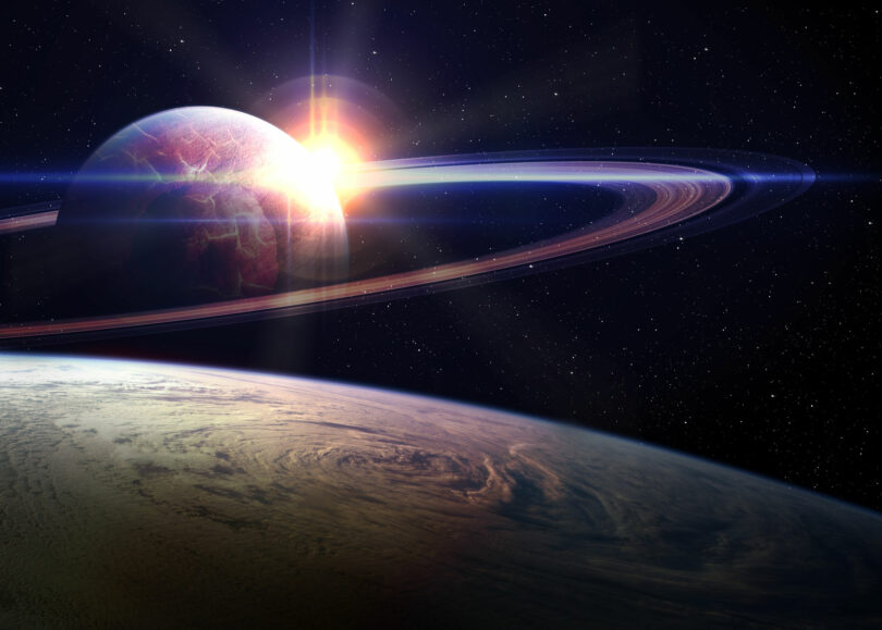 Ilustração de uma visão do espaço com o planeta terra, saturno e o sol.