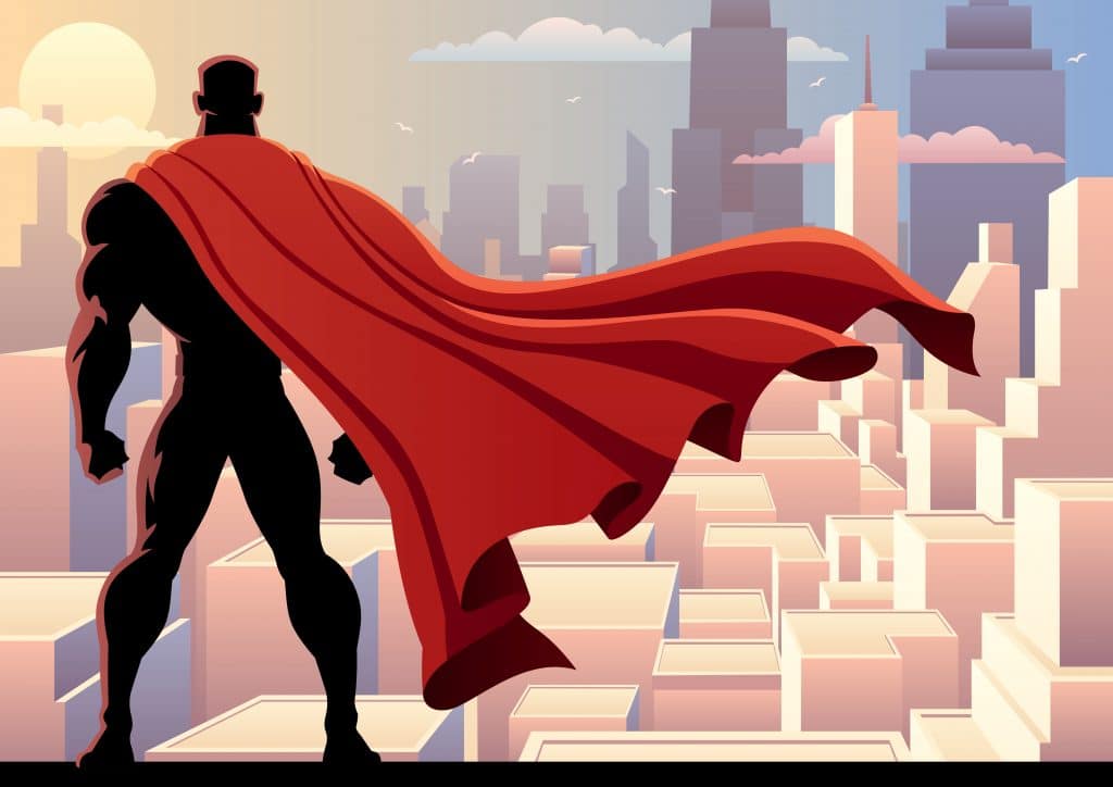 Imagem do um super herói dos quadrinhos clássicos. Ele está no alto observando a cidade de Gotan City. Ele usa uma grande capa vermelha.