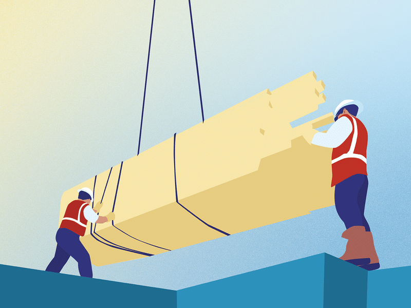 Dois trabalhadores movendo materiais para os alicerces de uma construção.