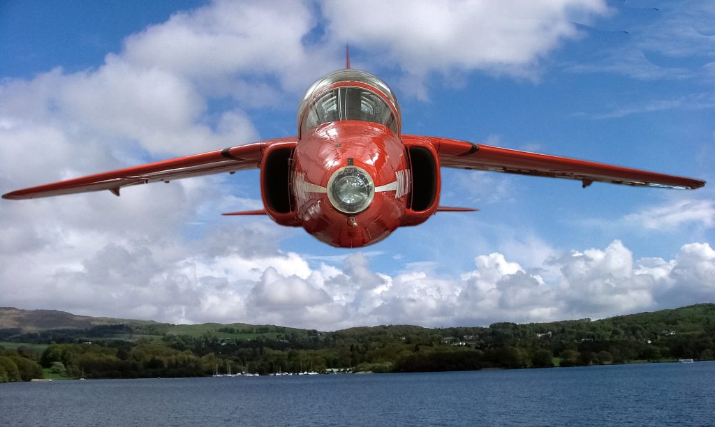 Avião sobrevoando um lago, prestes a cair.
