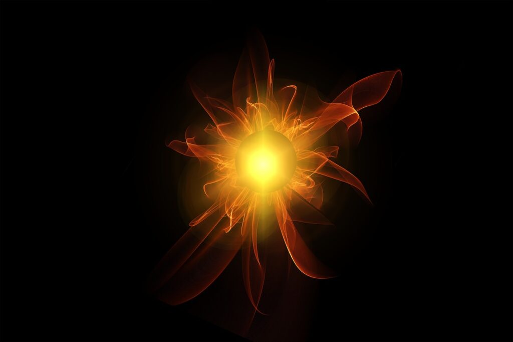 Bola de luz amarela com chamas laranja ao seu redor, em um fundo preto.