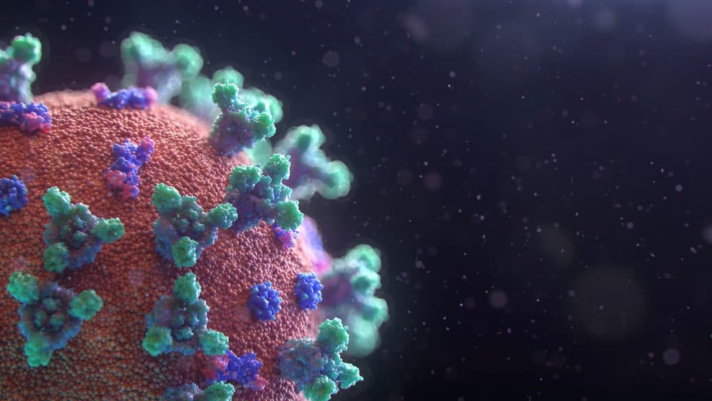 Ilustração de um vírus semelhante ao COVID-19 (coronavirus) visto de um microscópio.