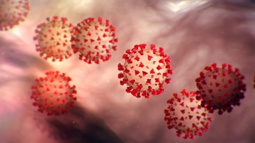 Ilustração do vírus COVID-19 (coronavírus) visto de um microscópio.