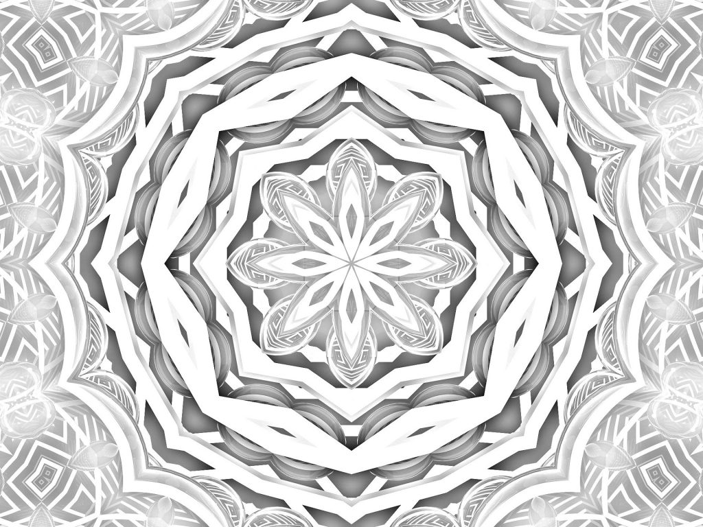 Imagem em preto de branco de uma mandala lunar.