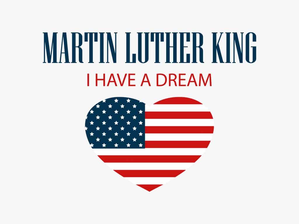 Imagem de um coração preenchido com as cores e os símbolos da bandeira dos Estados Unidos. Sobre a imagem do coração está escrito as frases: Martin Luther King - Eu tenho um sonho".