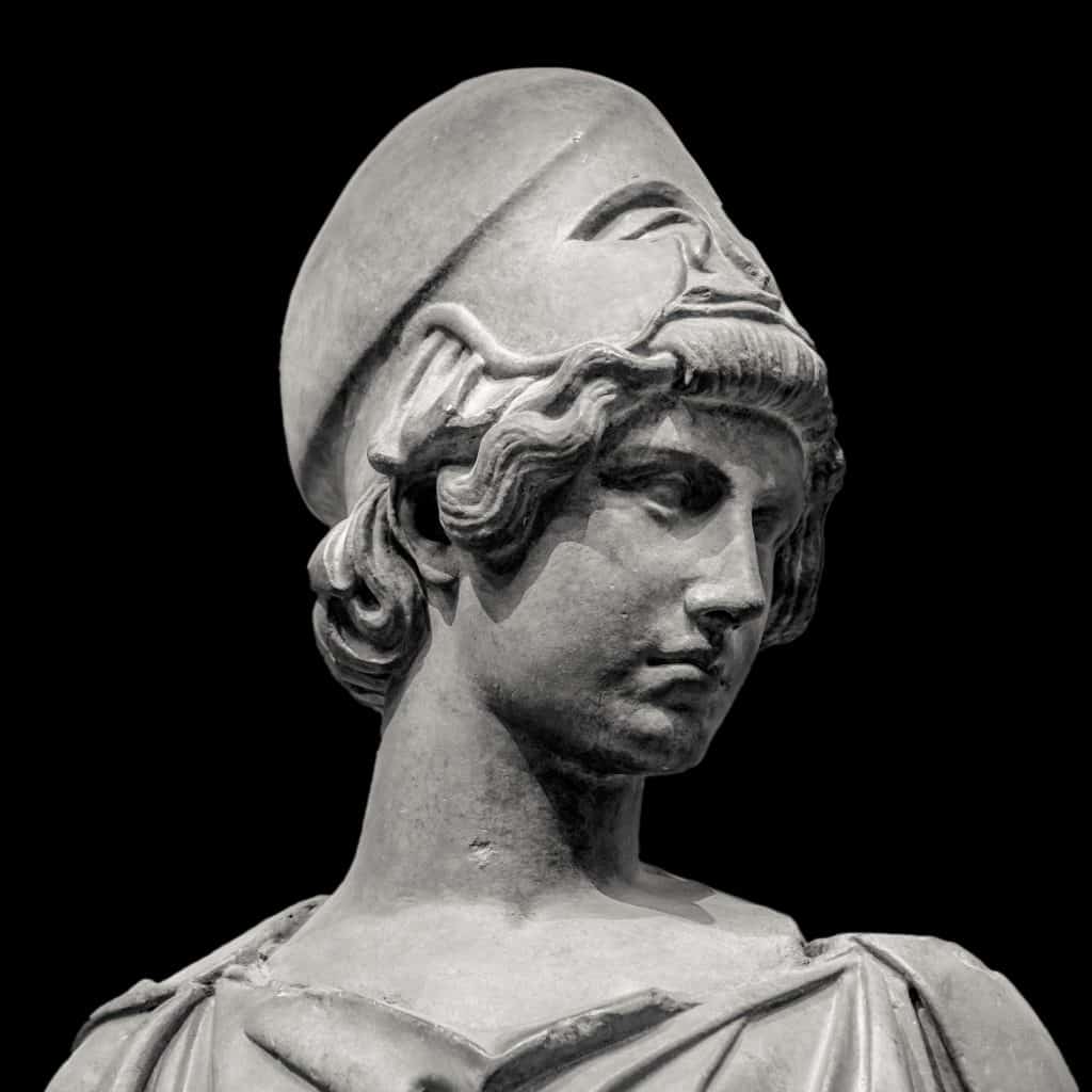 Imagem em preto e branco do busto da Deus Atena.