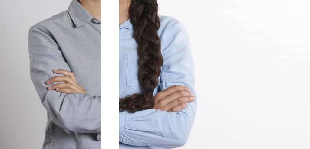 Imagem de um cortada represetando a metade superior do corpo de um homem e de uma mulher. Ambos usam camisa social - representando a igualdade de gênero.
