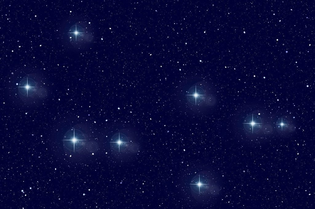 Ilustração de uma constelação de estrelas vista no céu noturno.