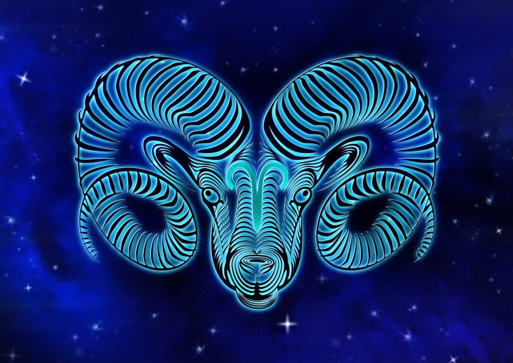 Imagem de fundo azul trazendo o símbolo do signo de áries, sendo representado por um carneiro.
