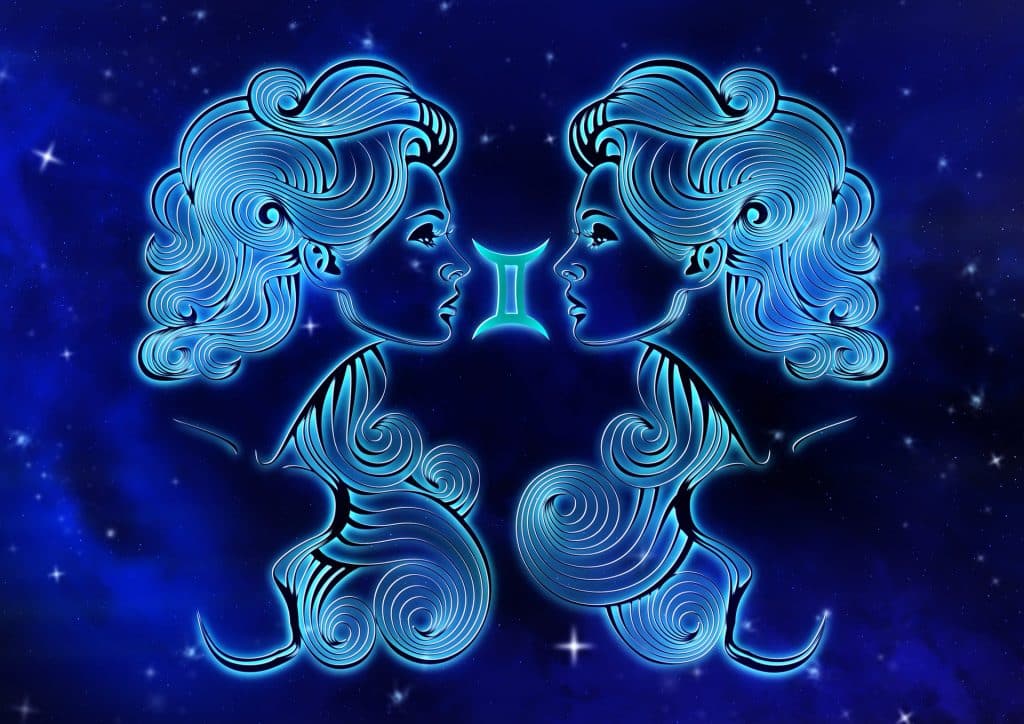 Imagem de fundo azul trazendo o símbolo do signo de gêmeos, sendo representado pela face de dois irmãos gêmeos.