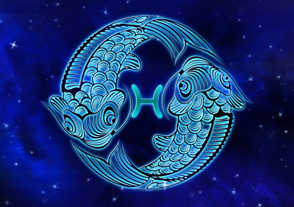 Imagem de fundo azul com alguns pontos de luz. Em destaque dois peixes unidos por um cordão enquanto nadam em direções opostas, representando o símbolo do signo de peixes.
