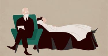 Mulher deitada no sofá e Sigmund Freud sentado na poltrona ao lado dela e fazendo perguntas.