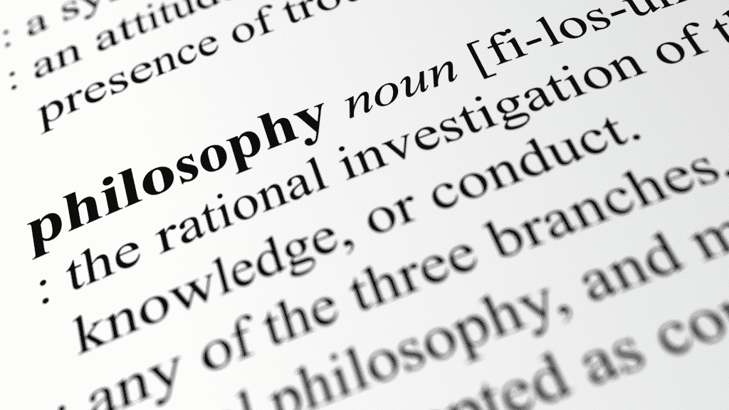 A palavra "philosophy" grafada em uma página de um livro.
