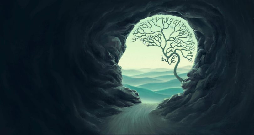 Arte de uma saída da caverna em um formato de uma cabeça humana, com uma árvore em formato de cérebro.