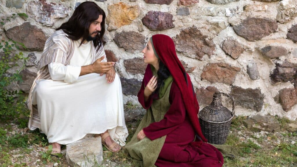 Imagem simbolizando Jesus conversando com uma mulher.