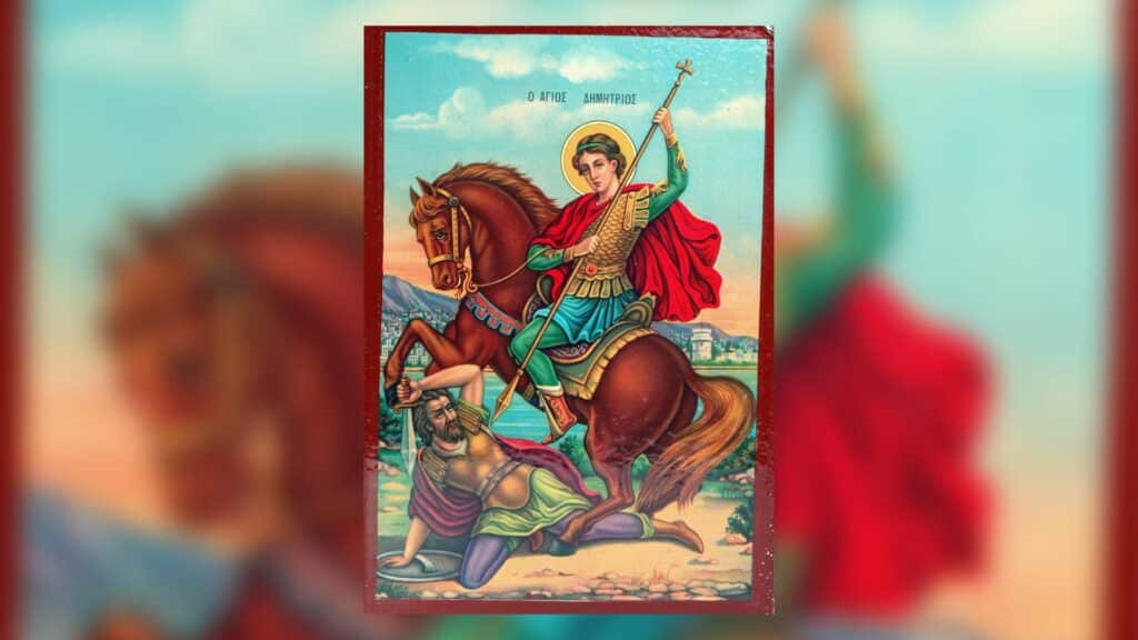 Imagem de são jorge segurando uma lança, montado em seu cavalo, atacando o dragão.
