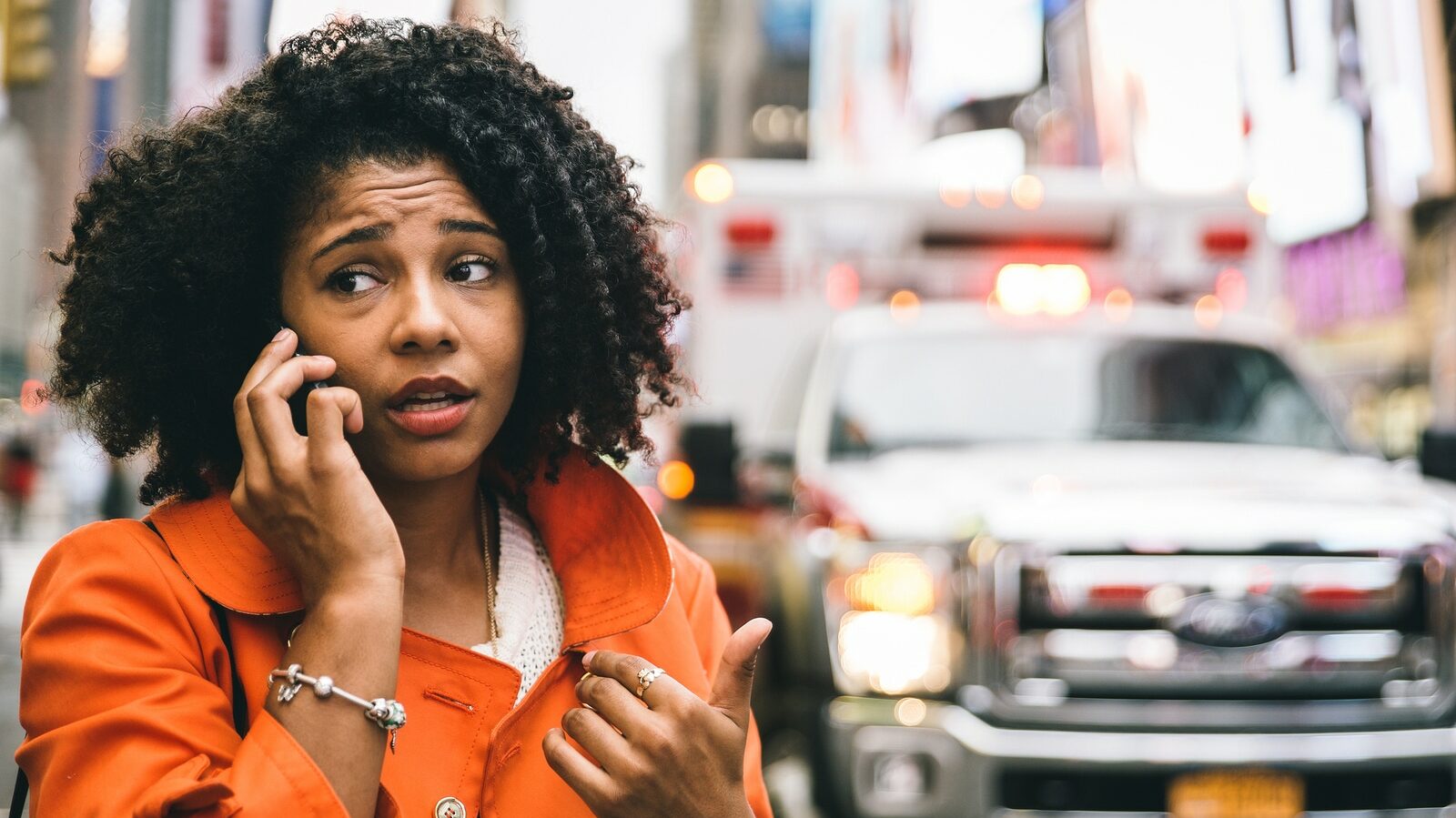 Afro American Woman Calling 911 In New York City. Concept About