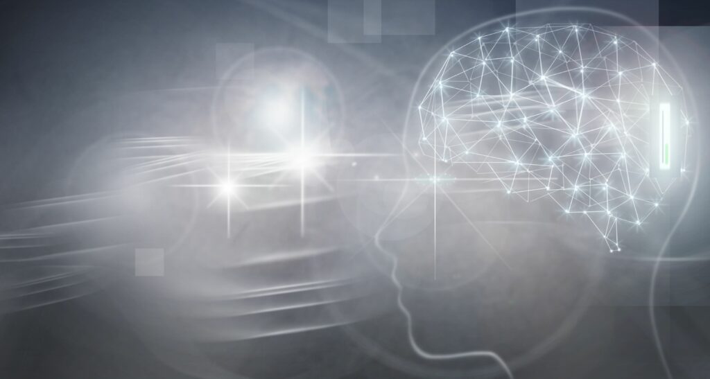 Figura, em tons de cinza, de uma cabeça humana, mostrando as conexões cerebrais.