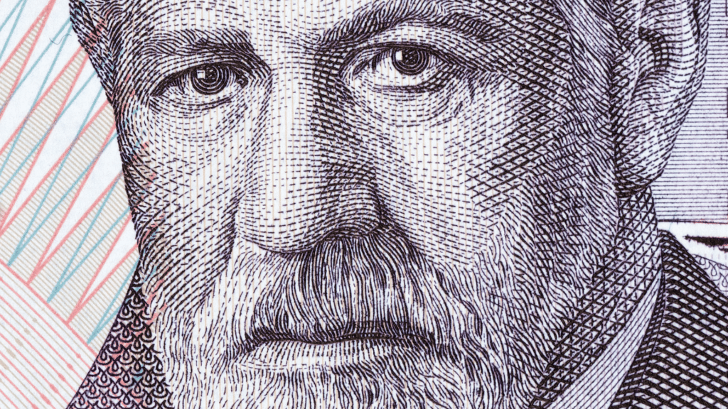 Desenho de rosto de Freud em cédula de dinheiro