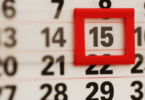 Número 15 no calendário, em cor vermelha.