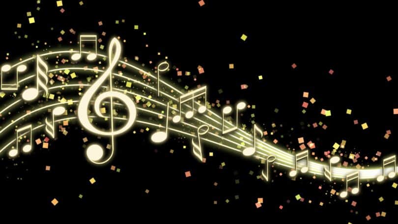 Imagem de fundo preto e em destaque, vários tipos de notas musicais na cor dourada.